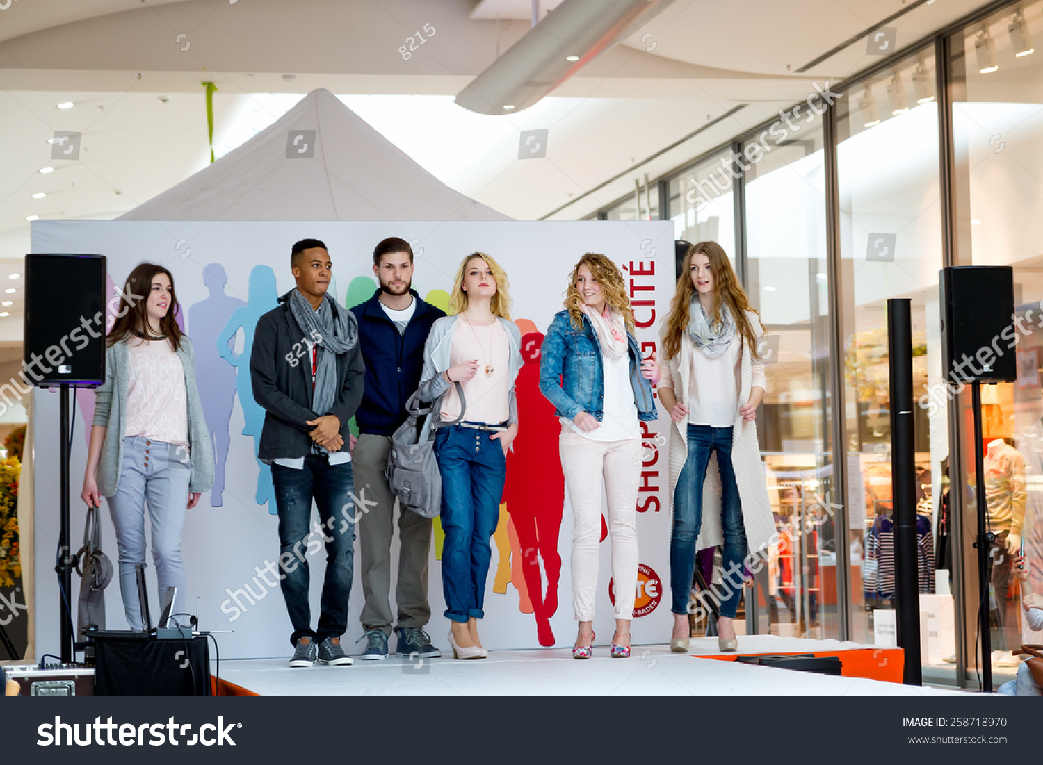 BADEN-BADEN, GERMANY - MARCH 7: Fashion model wearing clothes from the spring collection in a shopping center   on March 7, 2015 in Baden-Baden. Germany. Europe. #258718970