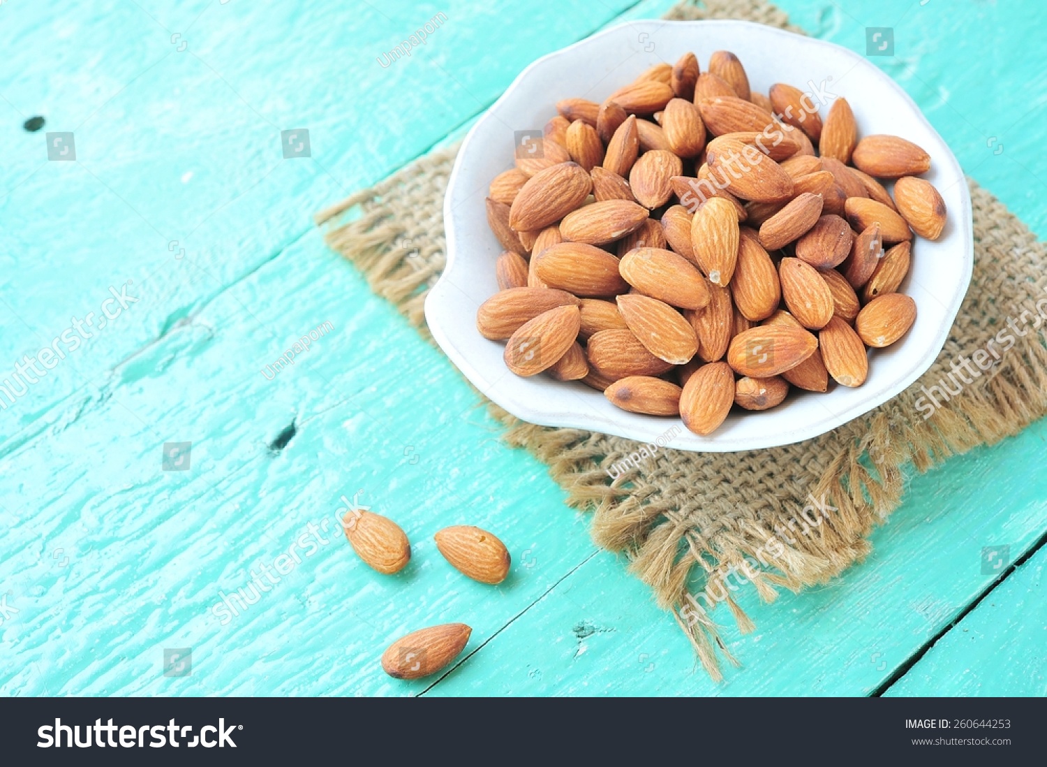 Almonds in bowl. #260644253