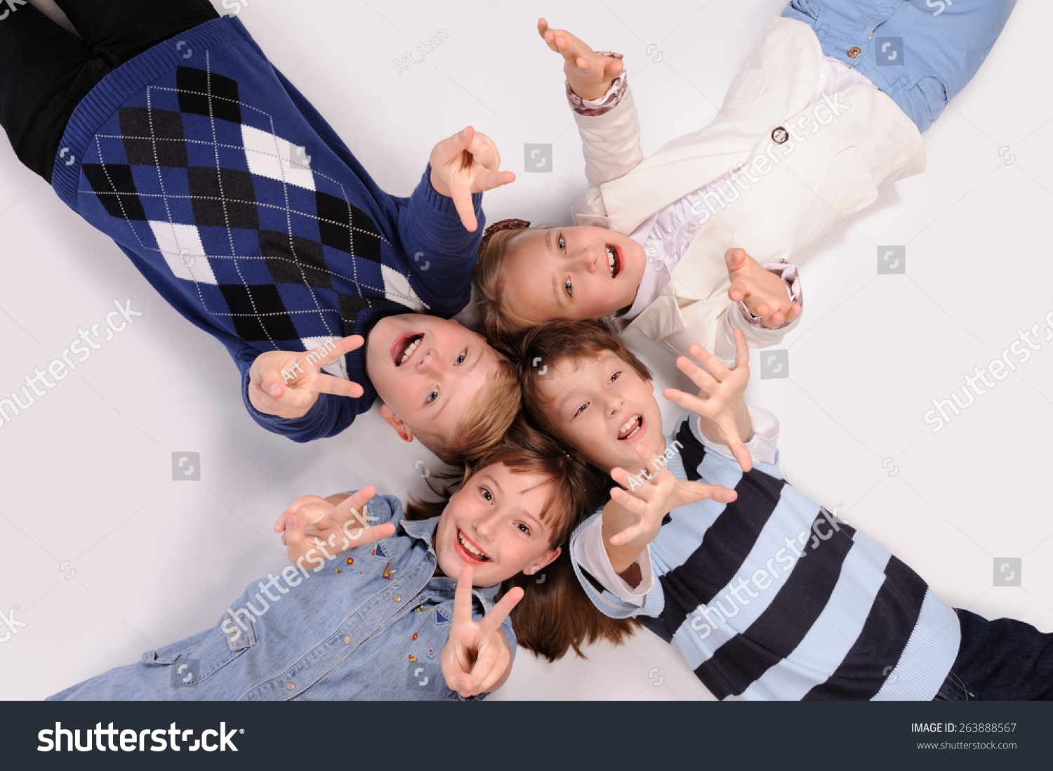 children lying on the floor isolated over white background #263888567