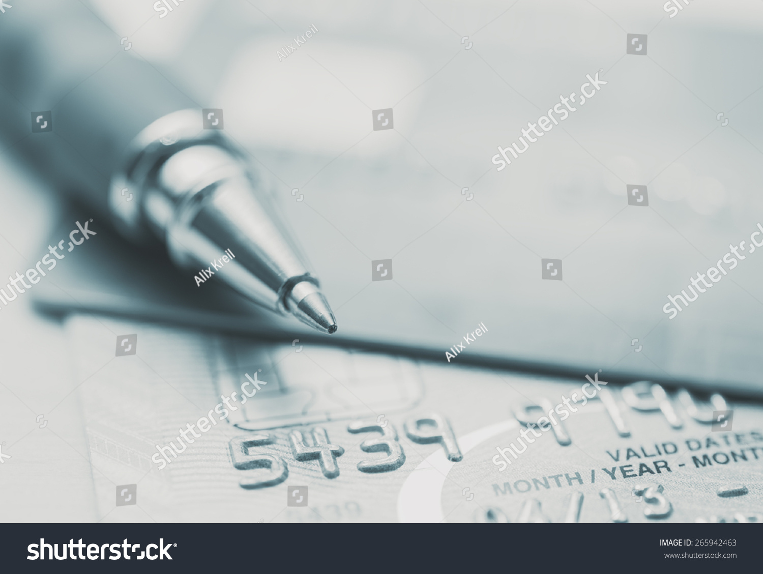 Split toned image of credit cards and a pen #265942463