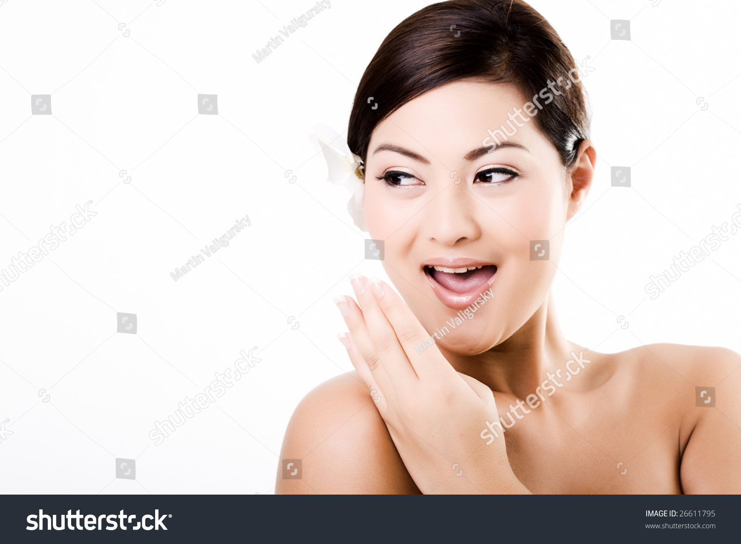 Portrait of an attractive asian female showing surprised face #26611795