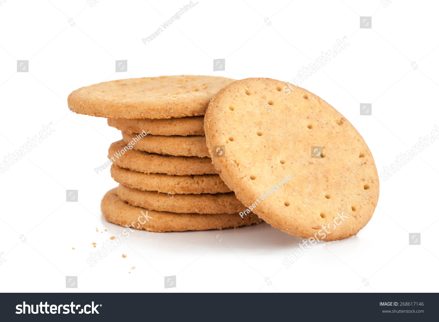 BISCUITS - A stack of delicious wheat round biscuits with a few crumbs isolated on white #268617146