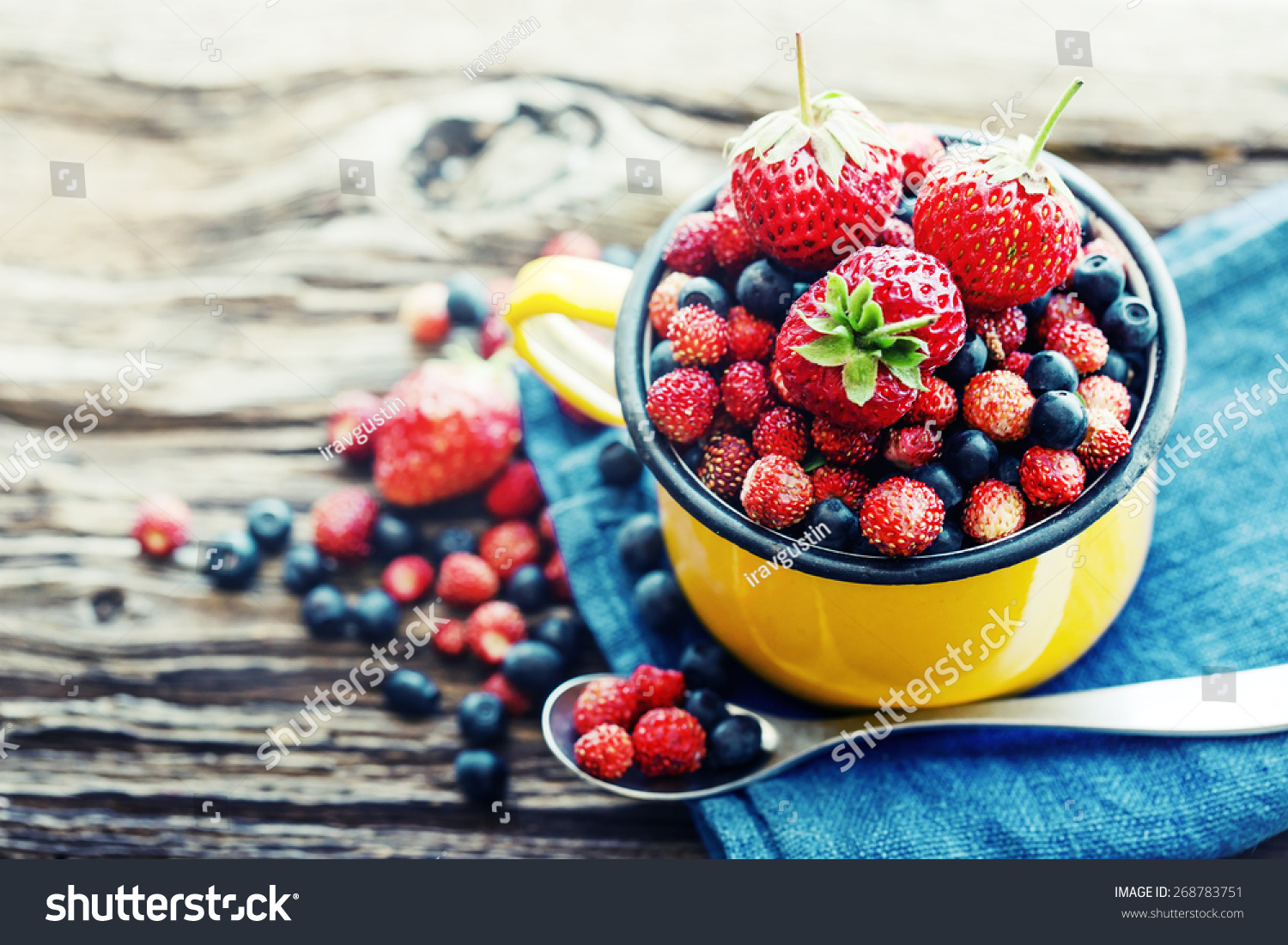 Berries on Wooden Background. Summer Organic Berry over Wood. Agriculture, Gardening, Harvest Concept #268783751