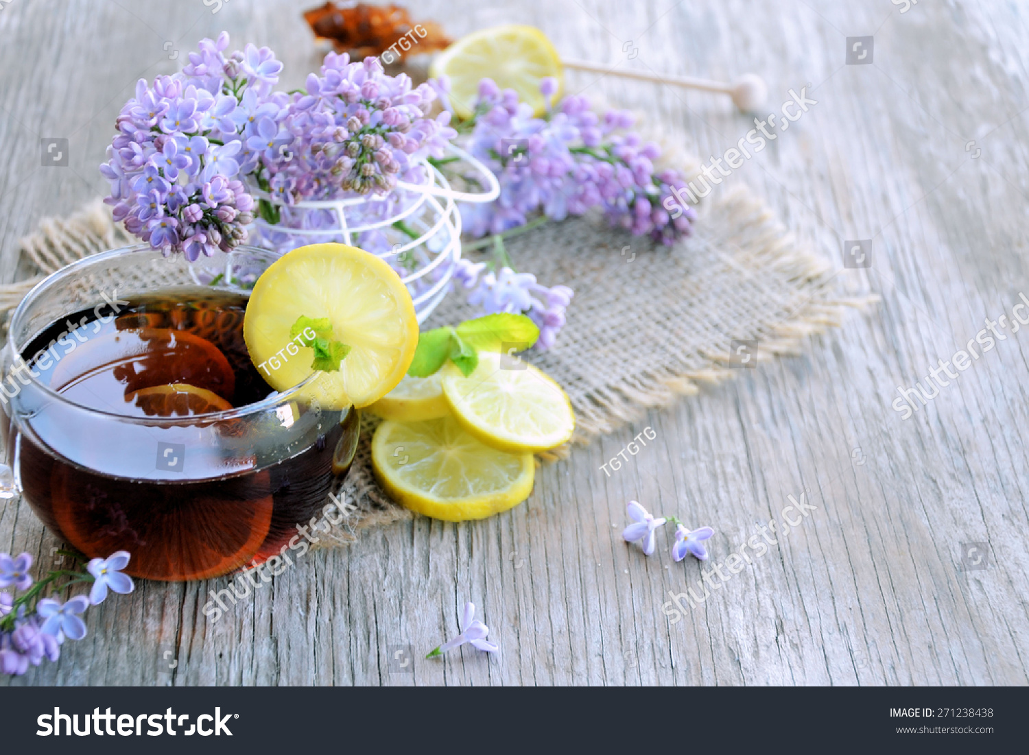 tea with lemon and sugar and flowers #271238438
