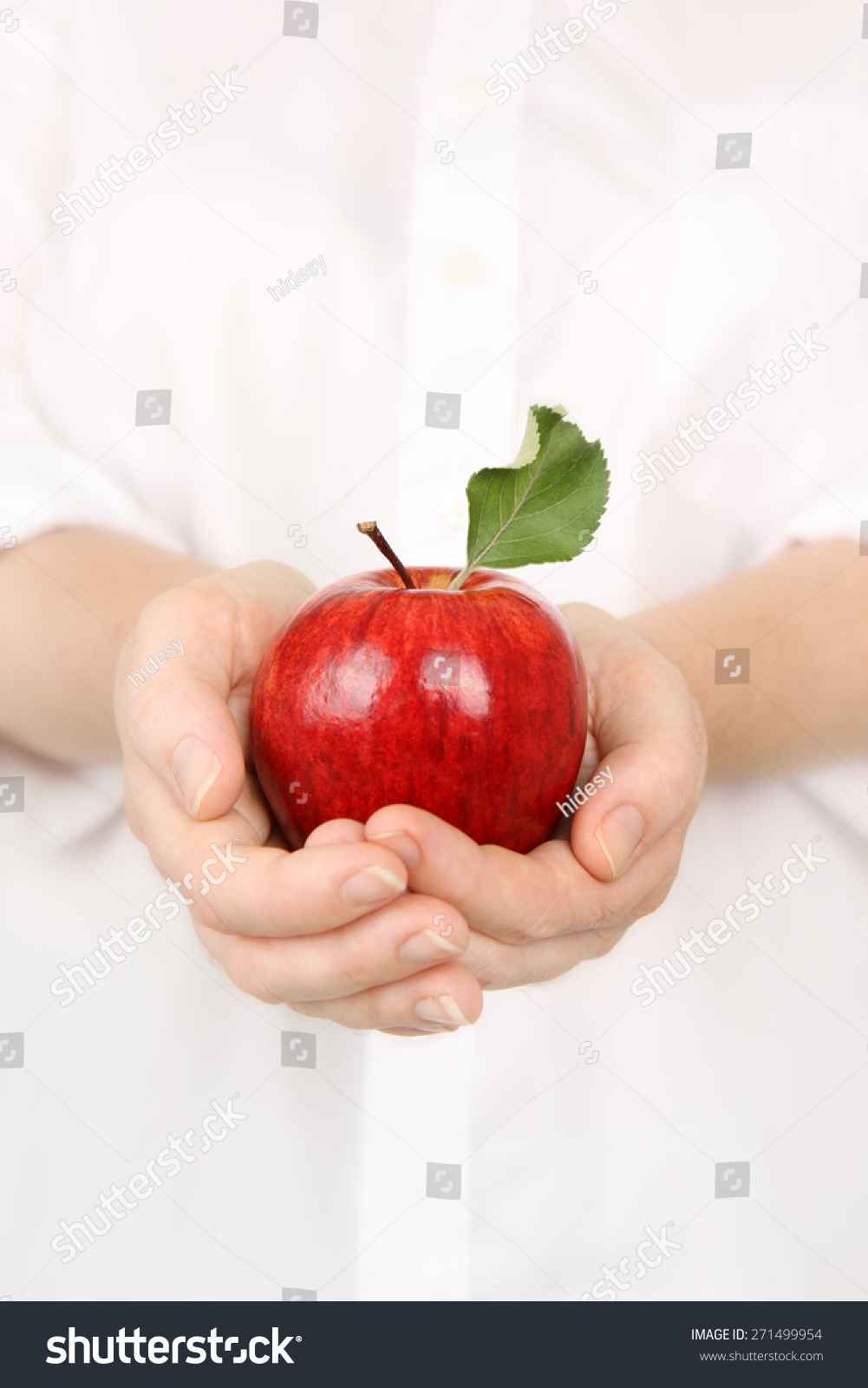 Delicious Apple cupped in hands #271499954
