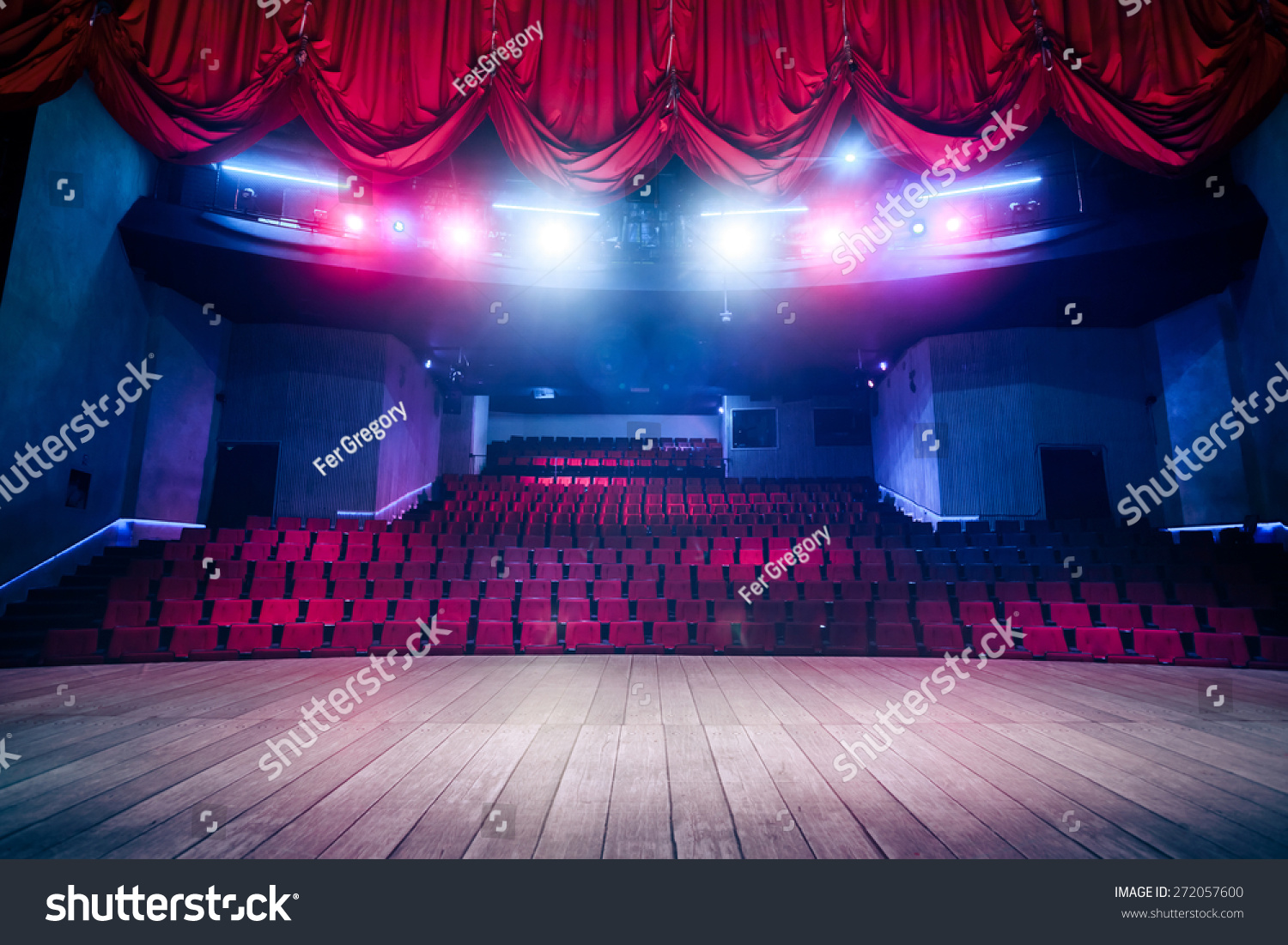 Theater curtain and stage with dramatic lighting #272057600