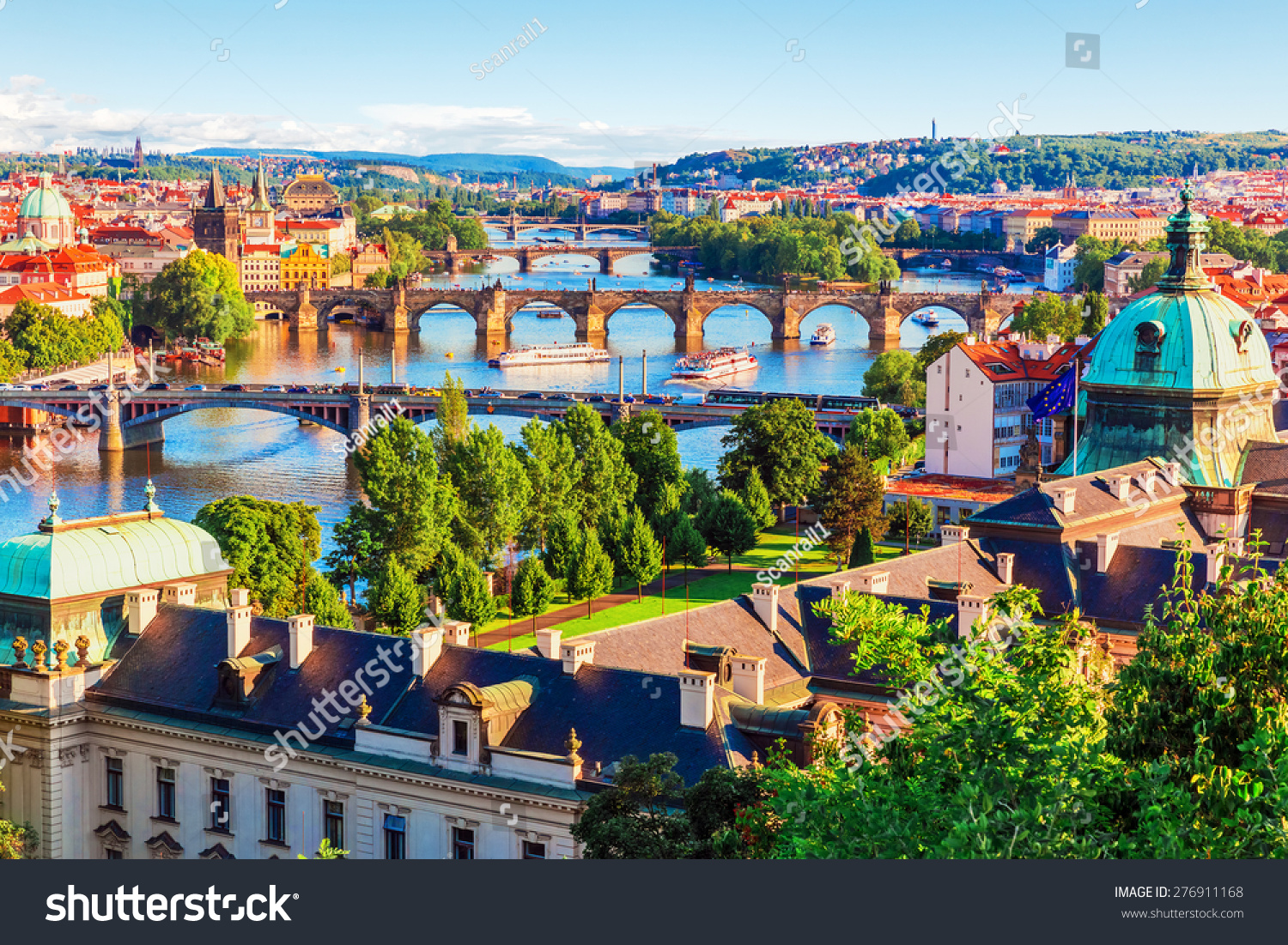 Scenic summer sunset aerial view of the Old Town pier architecture and Charles Bridge over Vltava river in Prague, Czech Republic #276911168