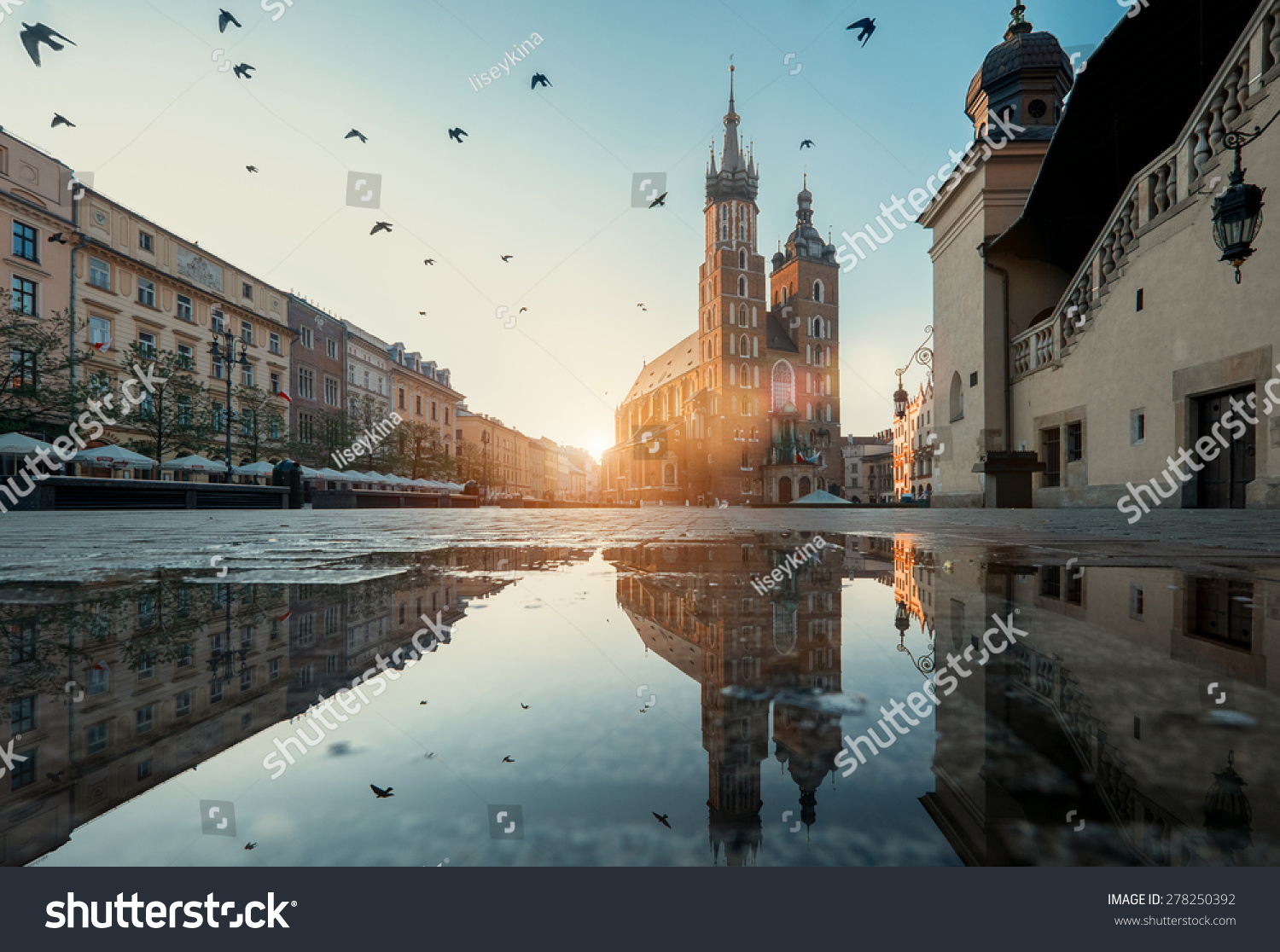 Market square and St. Mary's Basilica in Krakow, Poland. #278250392