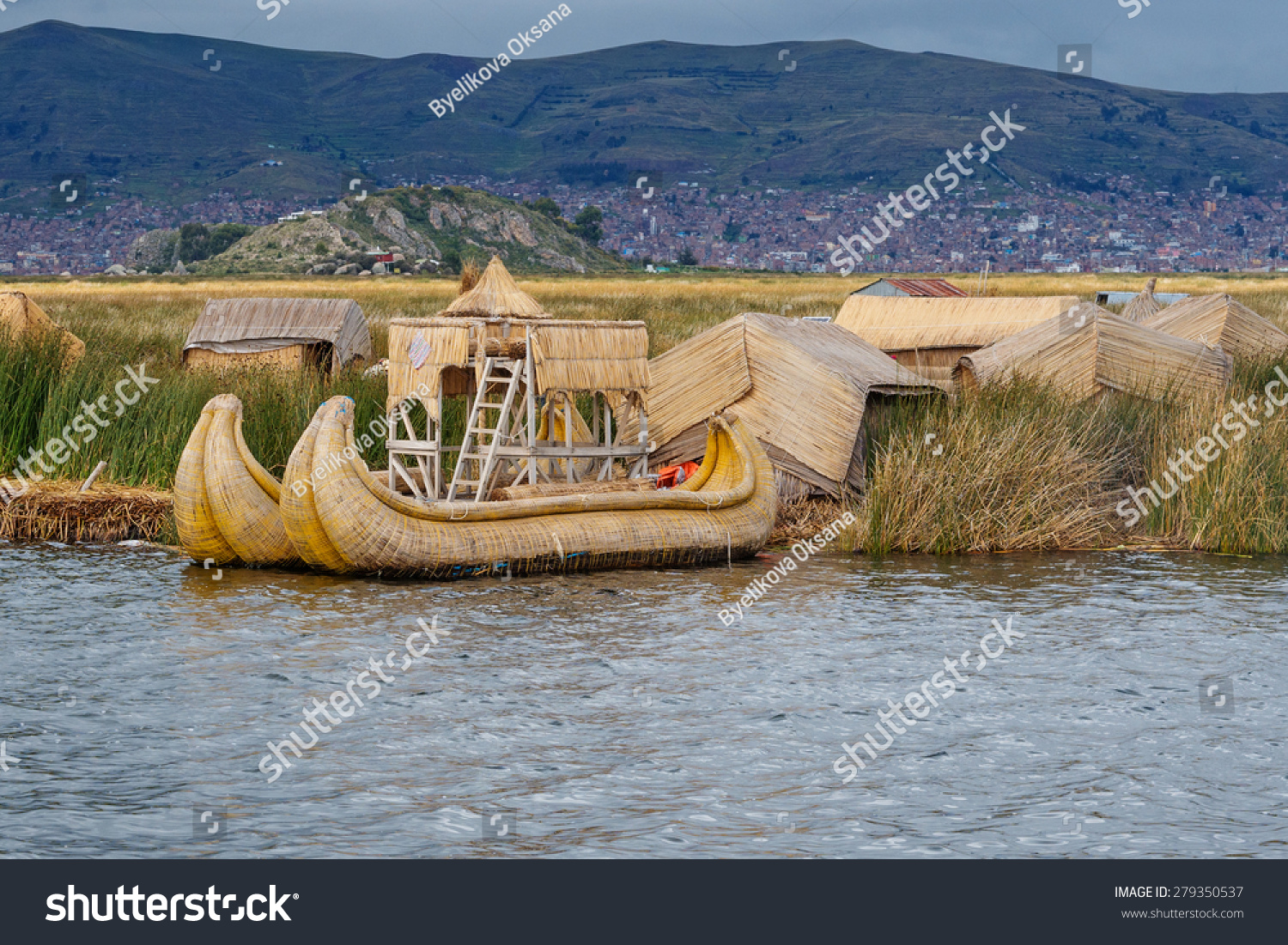 Traditional village on floating Uros  islands on lake Titicaca in Peru, South America  #279350537