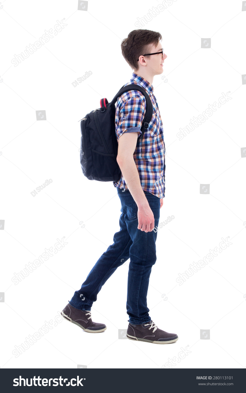 handsome teenage boy with backpack walking isolated on white background #280113101