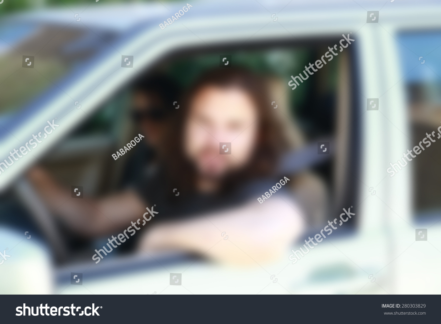 man sitting in the car ,blurred background #280303829