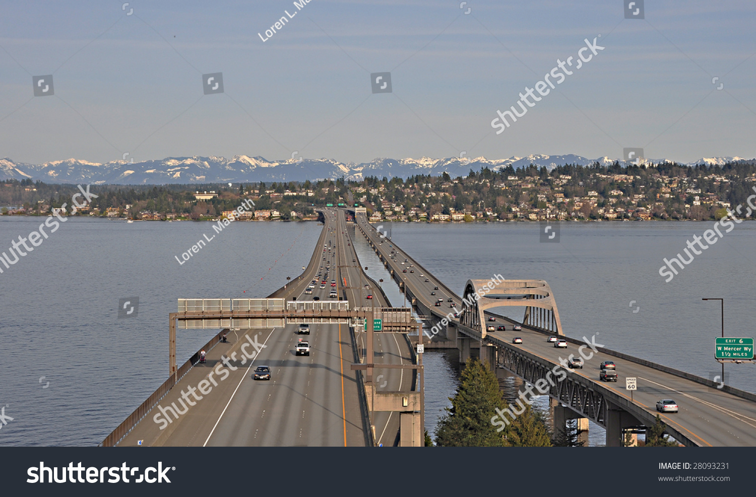 The I-90 floating bridge in Seattle. Mercer Island and the cascade mountains in the background. #28093231