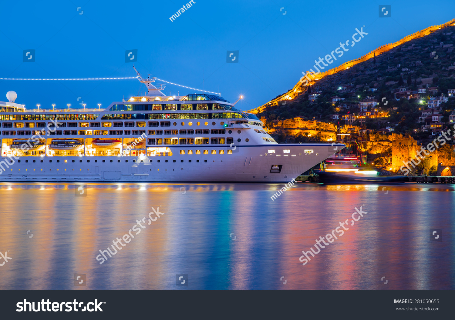 Beautiful white giant luxury cruise ship on stay at Alanya harbor #281050655