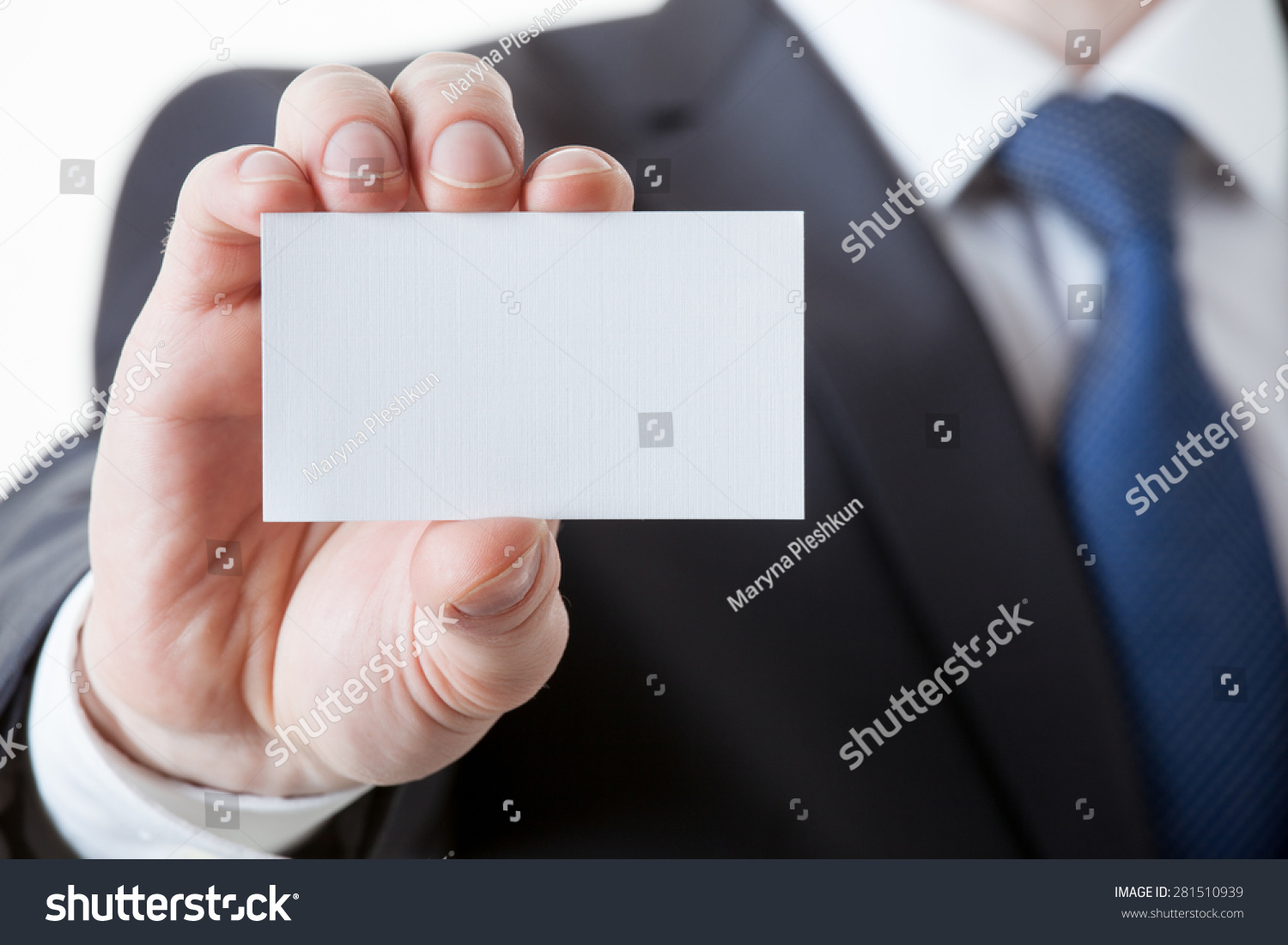 Unrecognizable businessman holding a visiting card, closeup shot #281510939