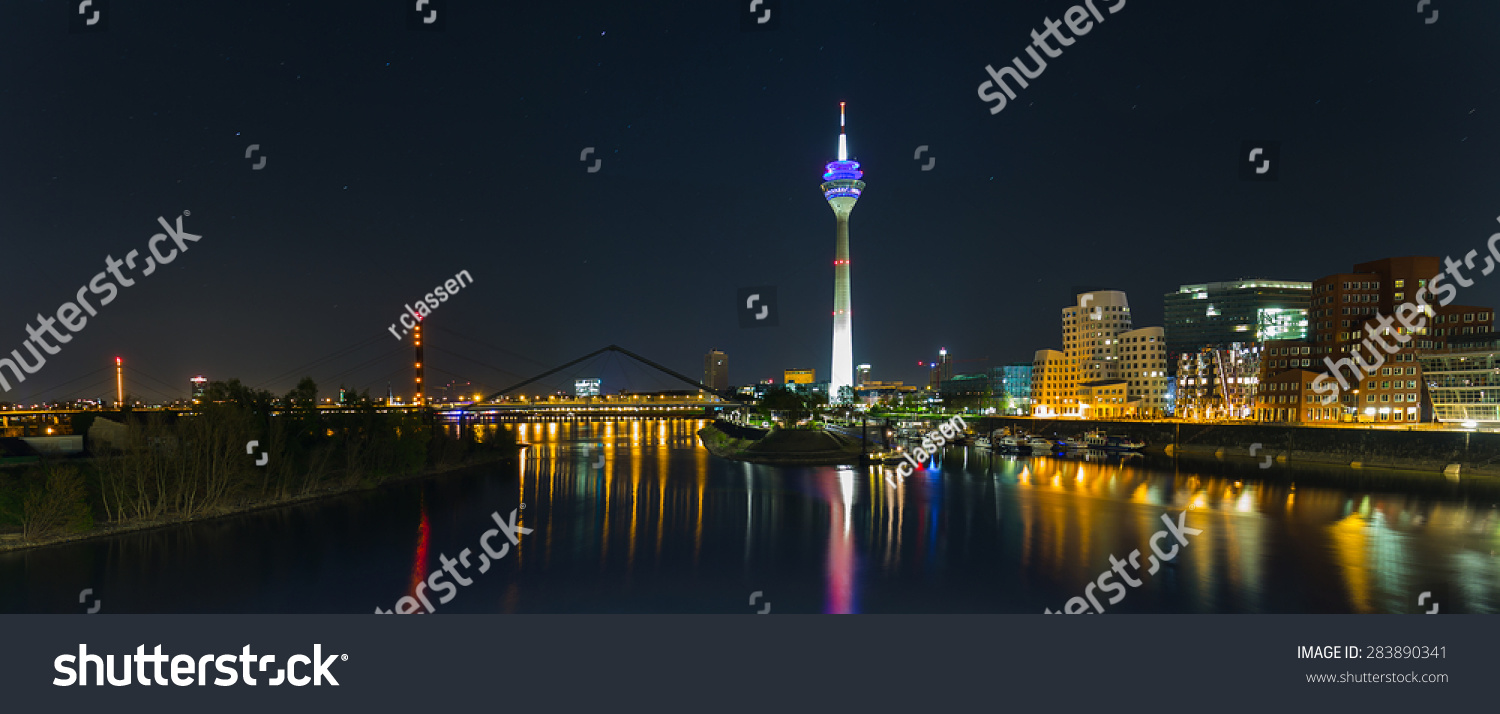 Dusseldorf with view on media harbor at night panorama  #283890341