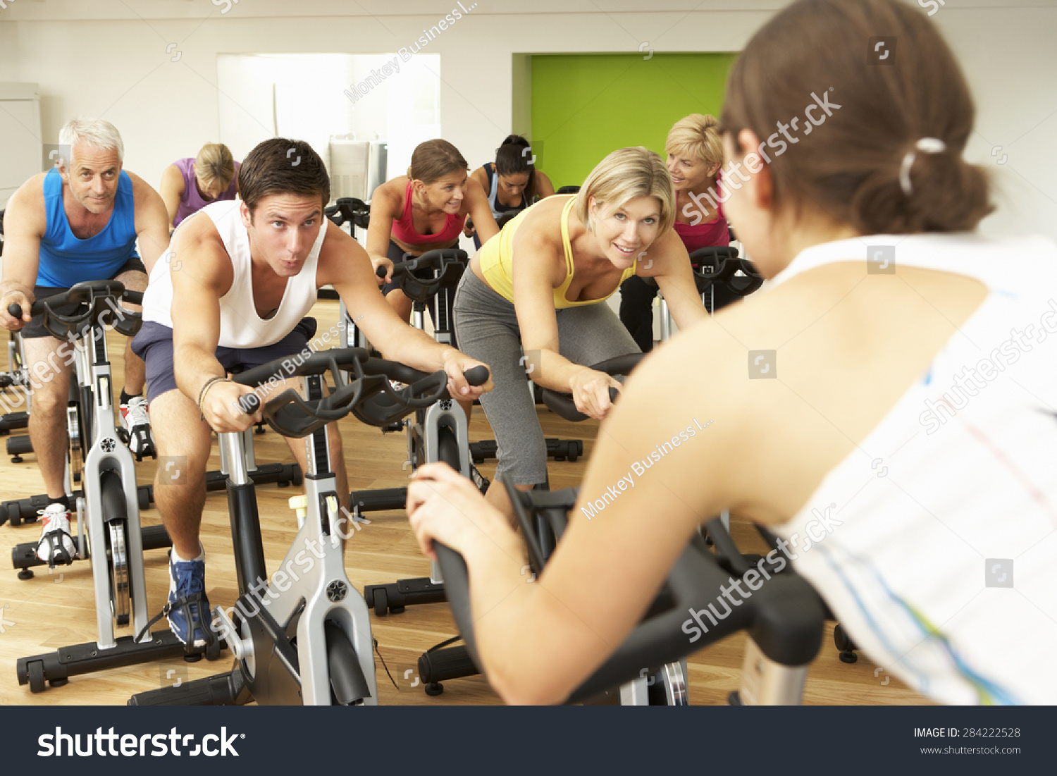 Group Taking Part In Spinning Class In Gym #284222528