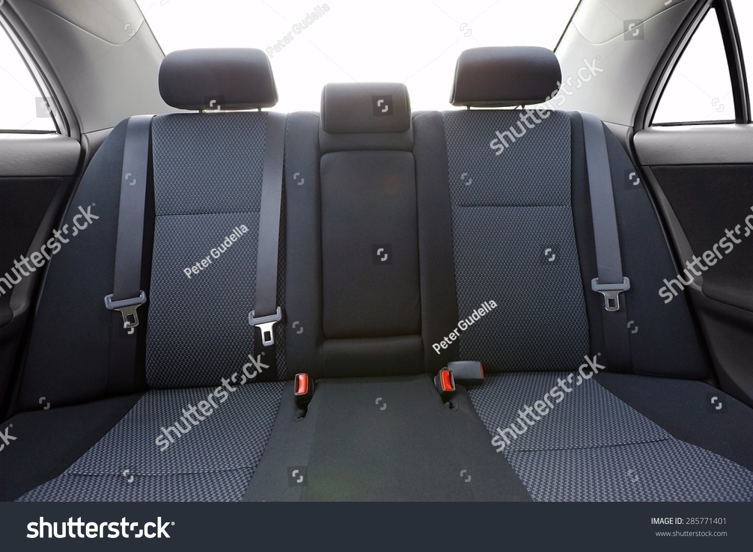 Car backseats with intentional light flare from the burnt out background #285771401