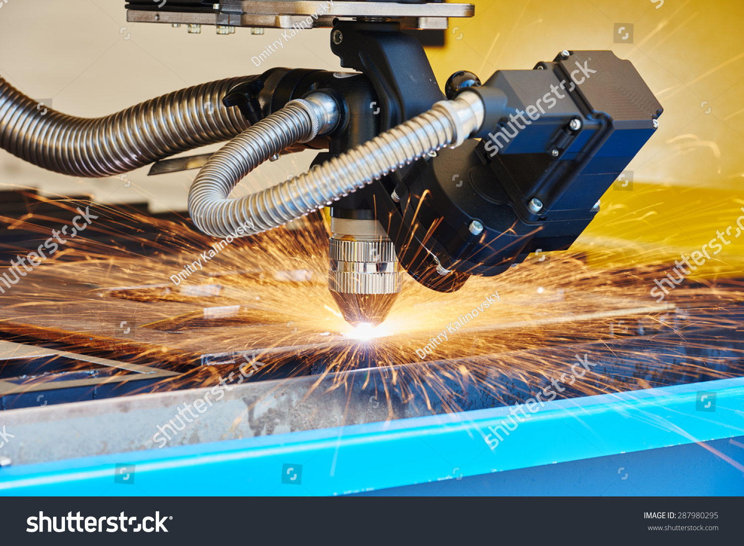 metal working. Plasma or Laser cutting technology of flat sheet metal steel material with sparks #287980295