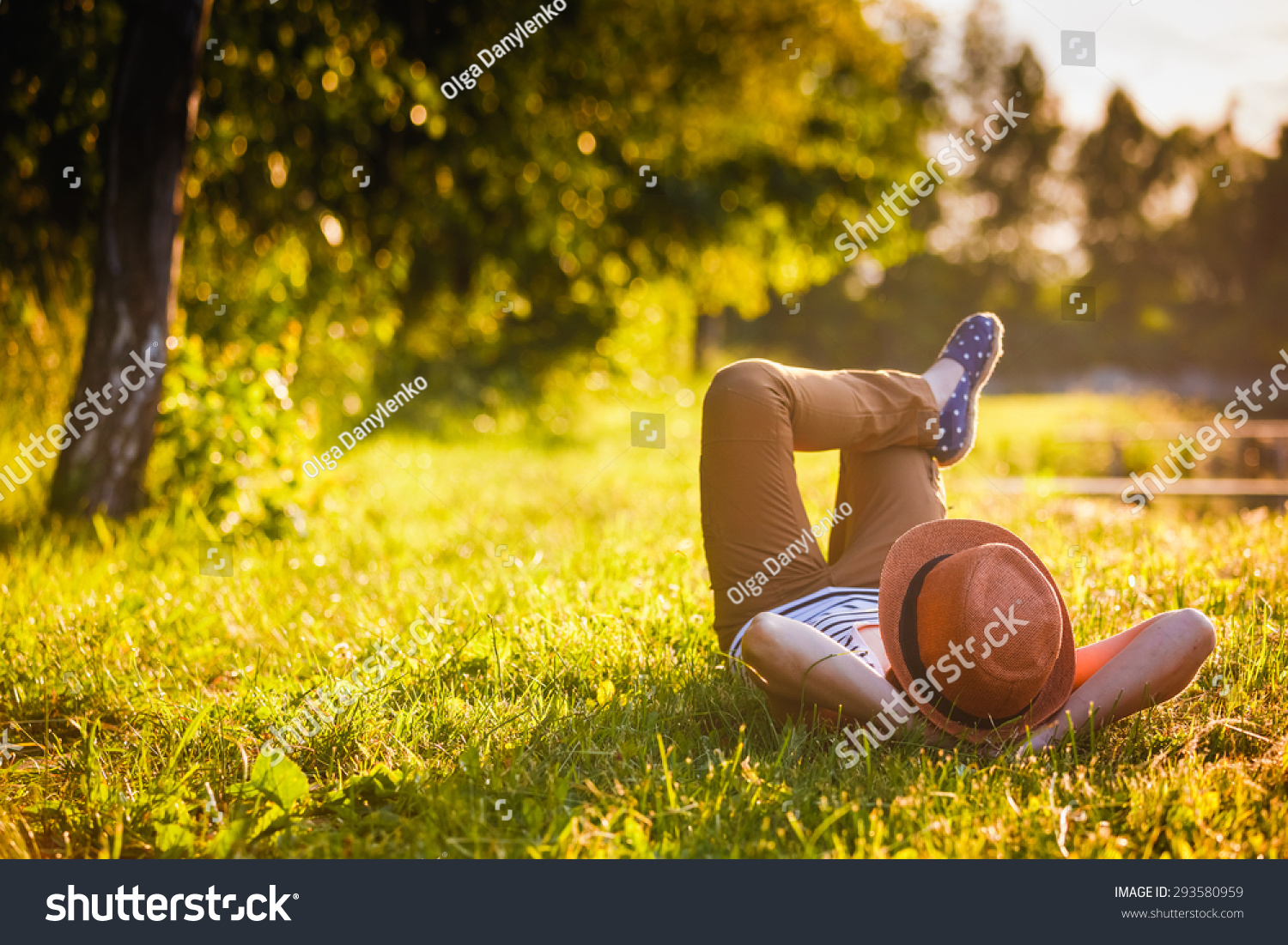 Trendy Hipster Girl Relaxing on the Grass #293580959