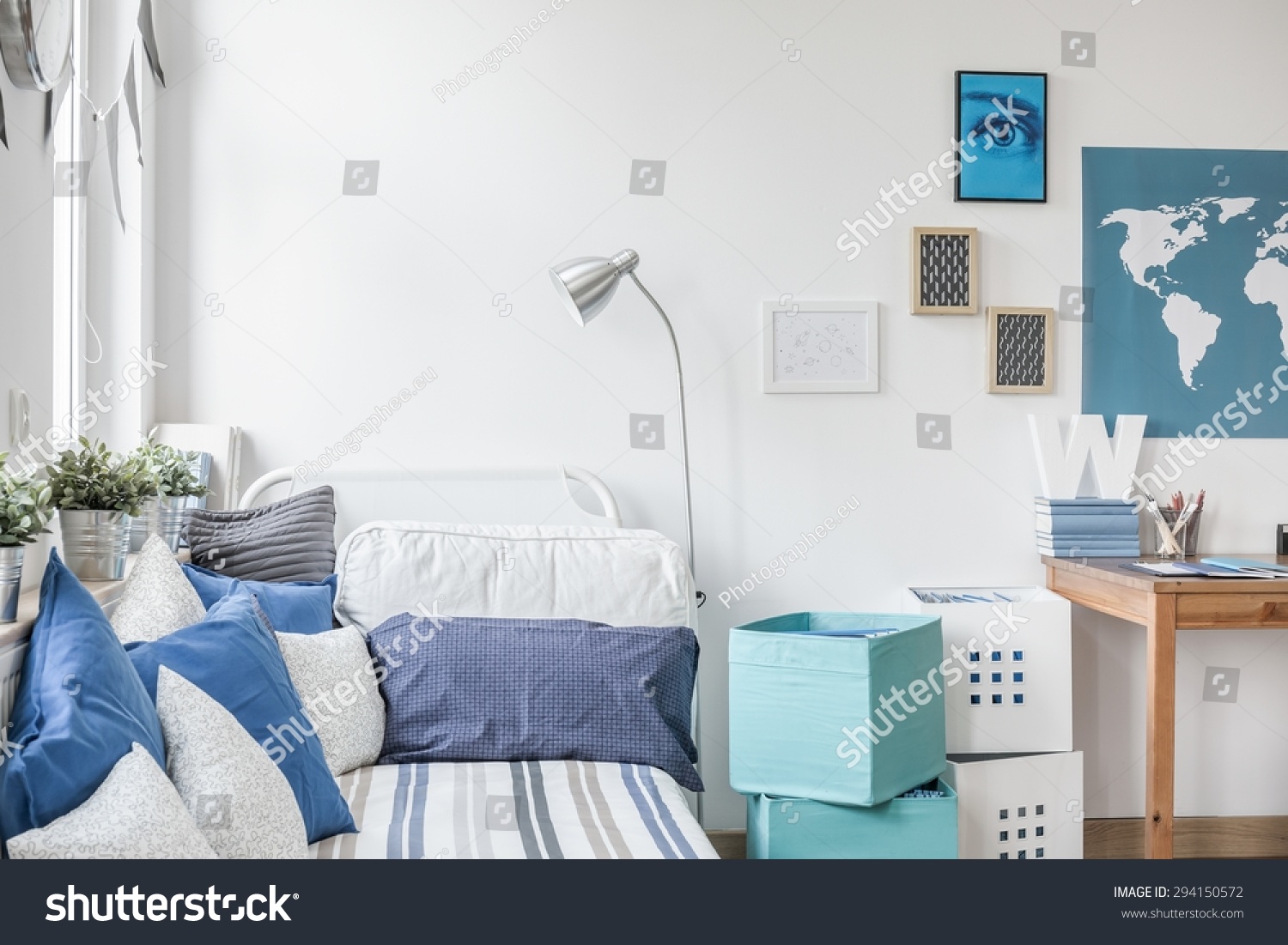 White and blue designed teen boy bedroom #294150572