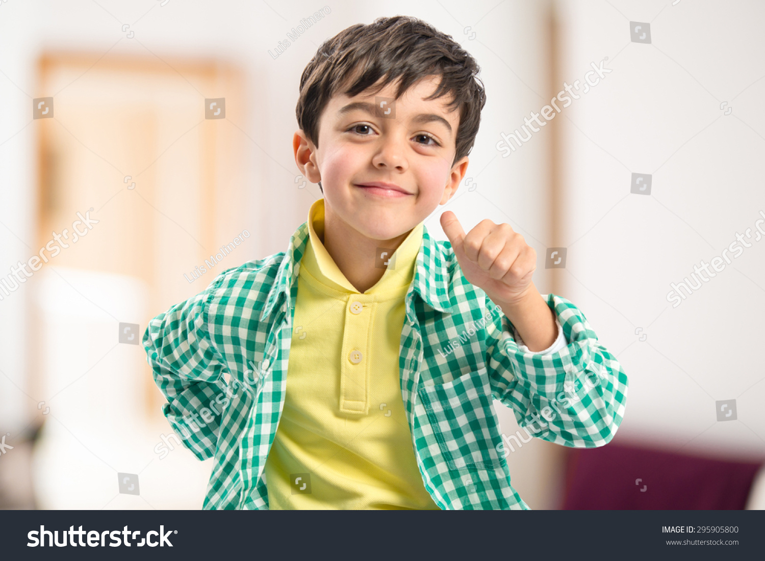 kid doing victory gesture #295905800