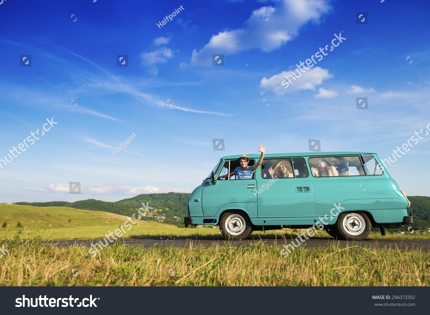 Teenage friends on a road trip on a summers day  #296073392
