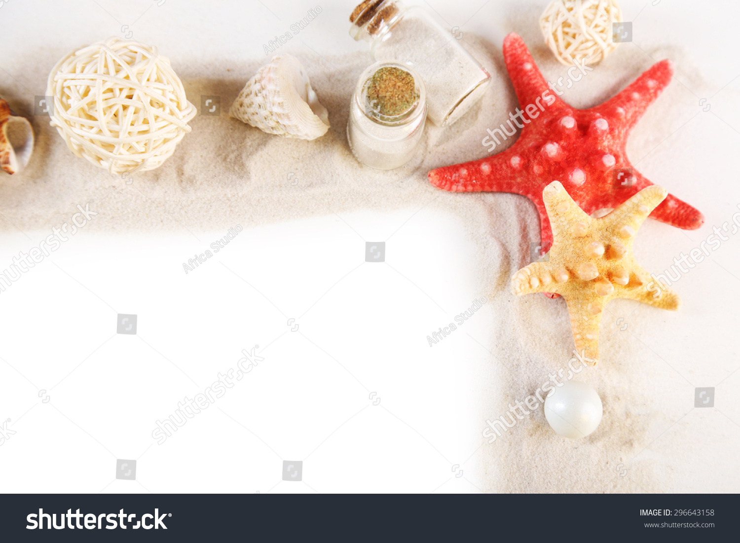 Frame of collection of seashells and sand isolated on white #296643158