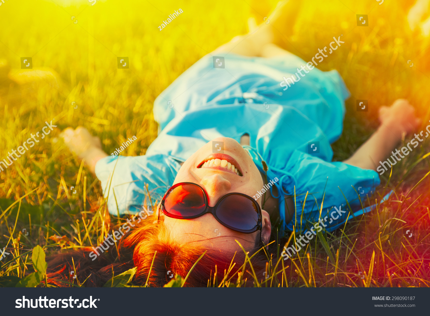 happy and smiling woman relaxing outdoors  #298090187