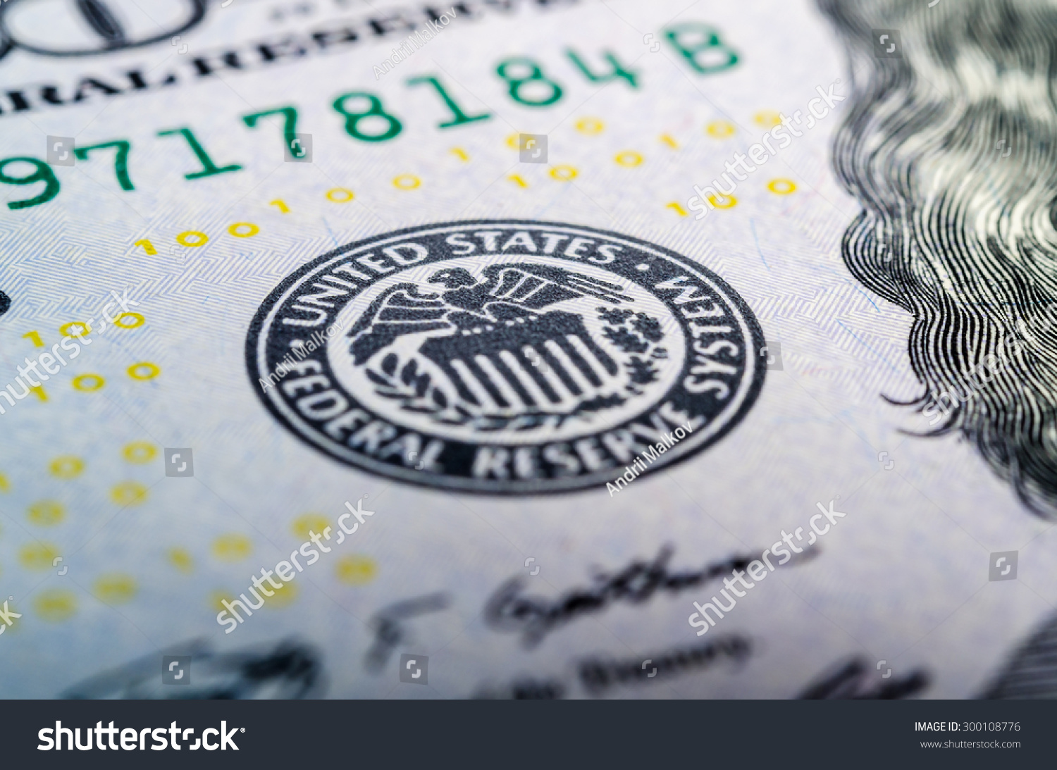 Federal reserve system symbol on hundred dollar bill closeup macro shot #300108776