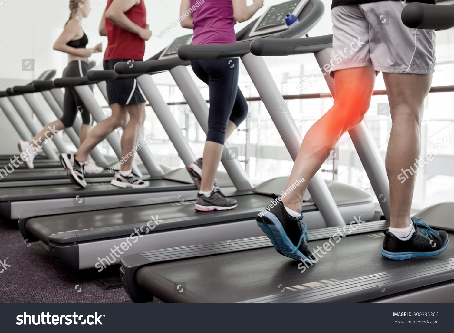 Digital composite of Highlighted knee of man on treadmill #300335366