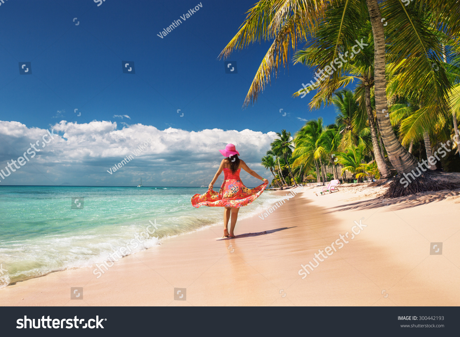 Carefree, Young woman relaxing on the islands beach #300442193