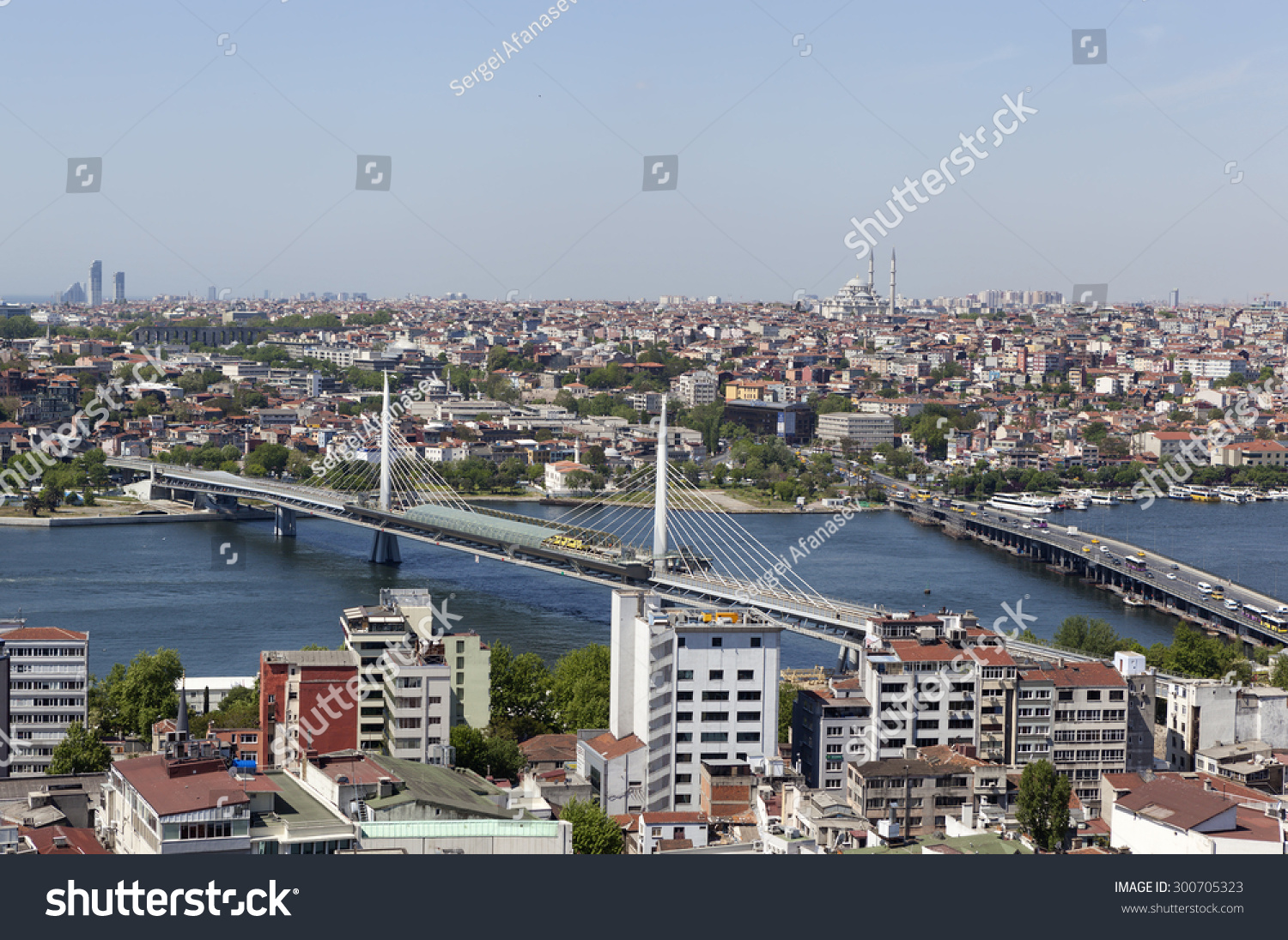 ISTANBUL, TURKEY - MAY 11, 2015: Photo of View of the historic center and the bridge across the Golden Horn. #300705323