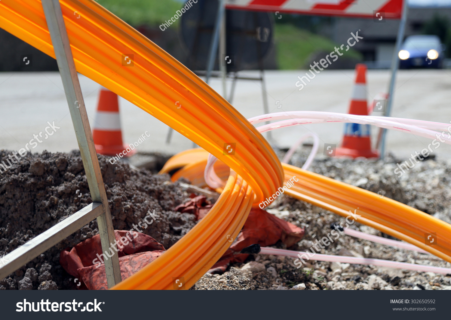 road excavation for the laying of optical fiber for very high speed internet #302650592