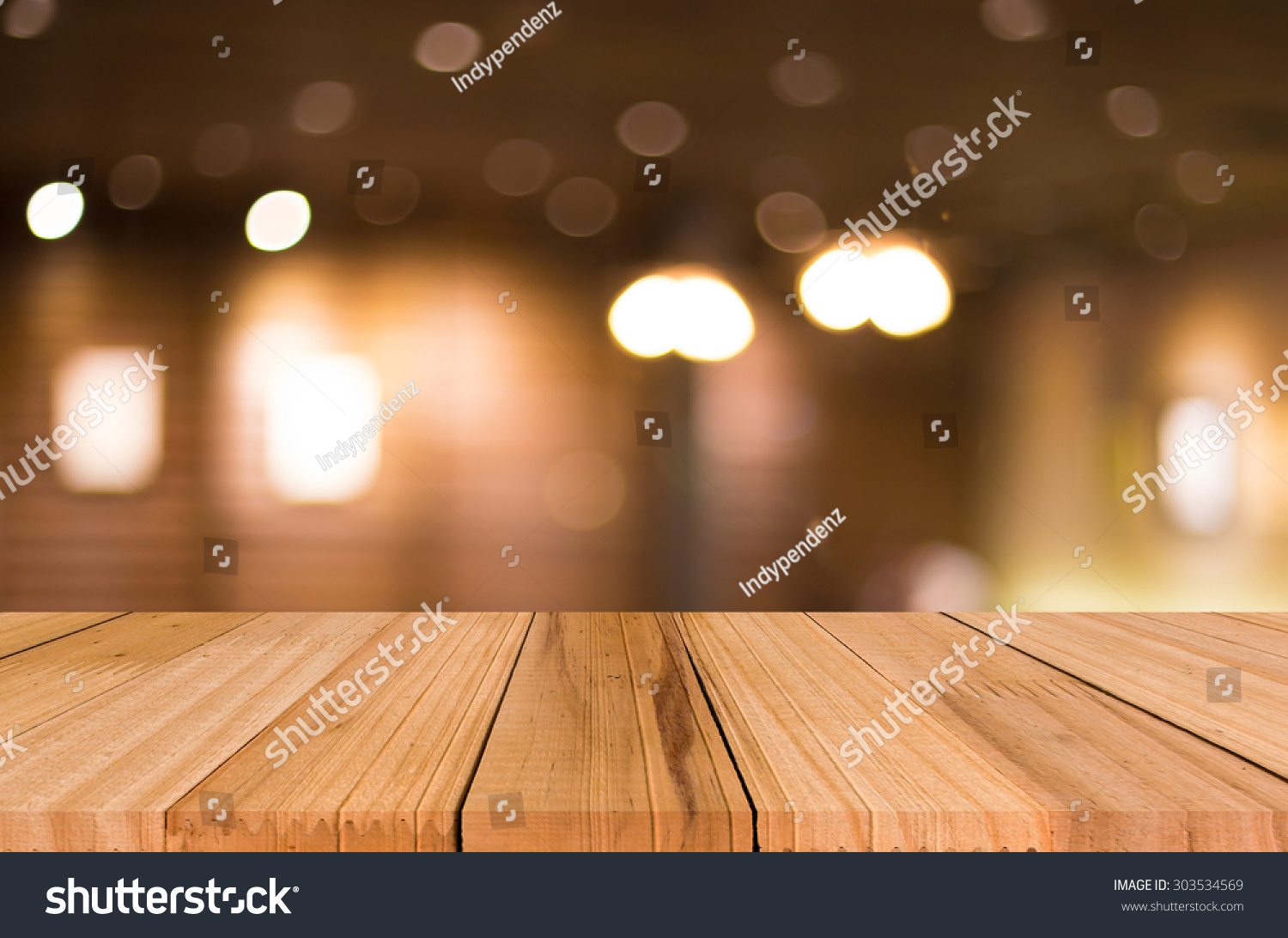 Selected focus empty brown wooden table and Coffee shop blur background with bokeh image. for your photomontage or product display. #303534569