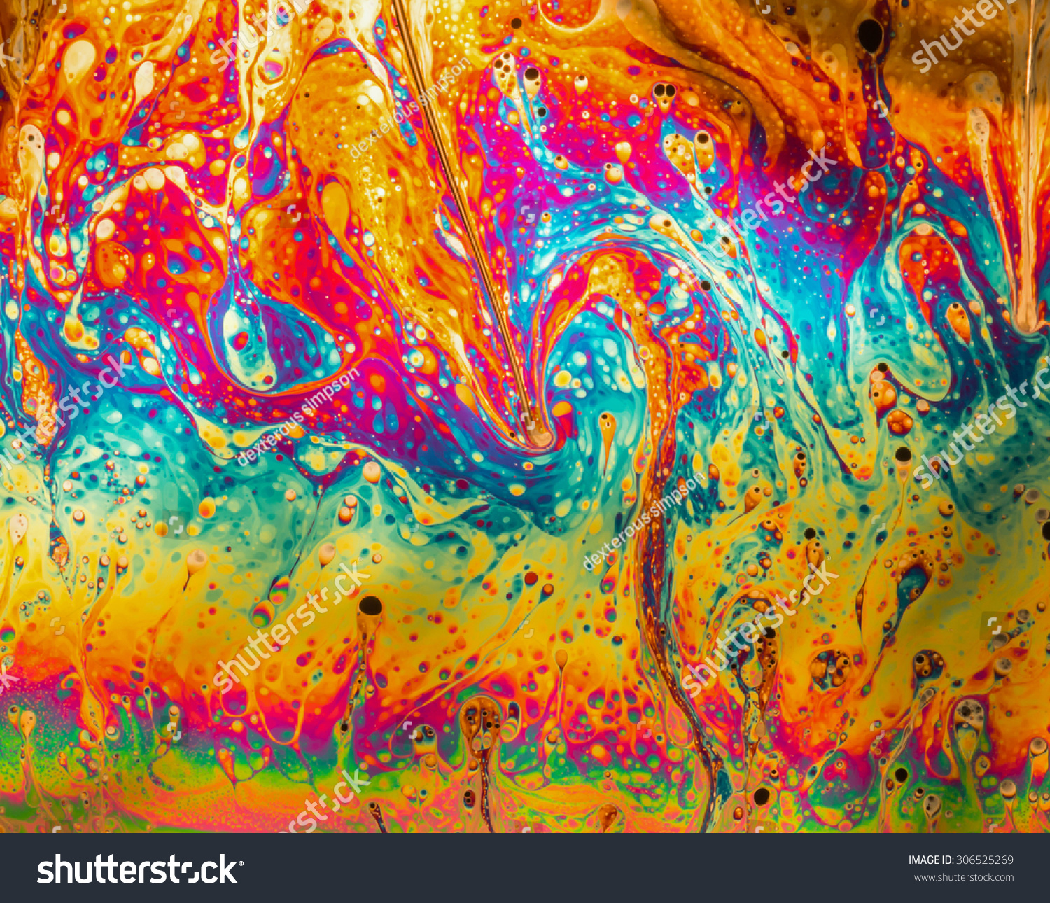 Psychedelic abstract background formed by soap bubble reflecting light #306525269