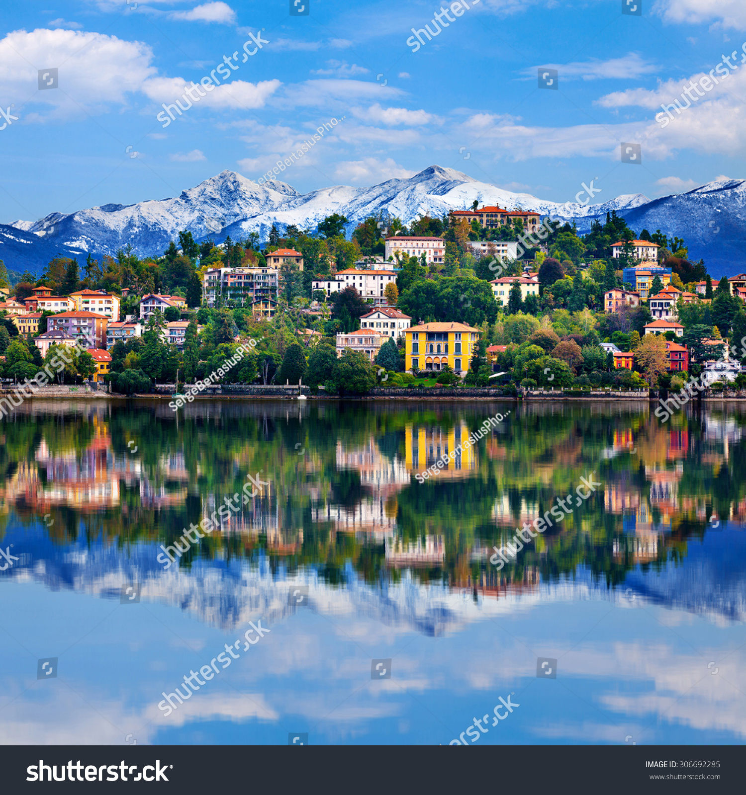 View over Lake Maggiore and Alps mountains with Verbania town in Northern Italy. #306692285