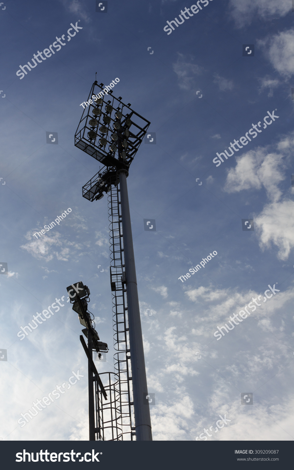 sport light of football stadium with blue sky #309209087