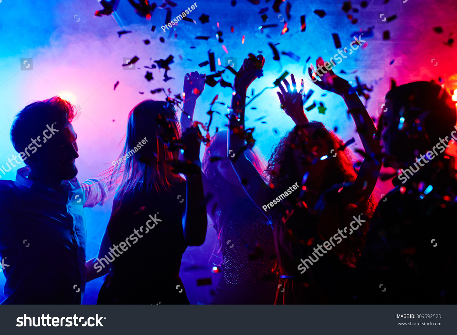 Dancing people at nightclub on Halloween night #309592520