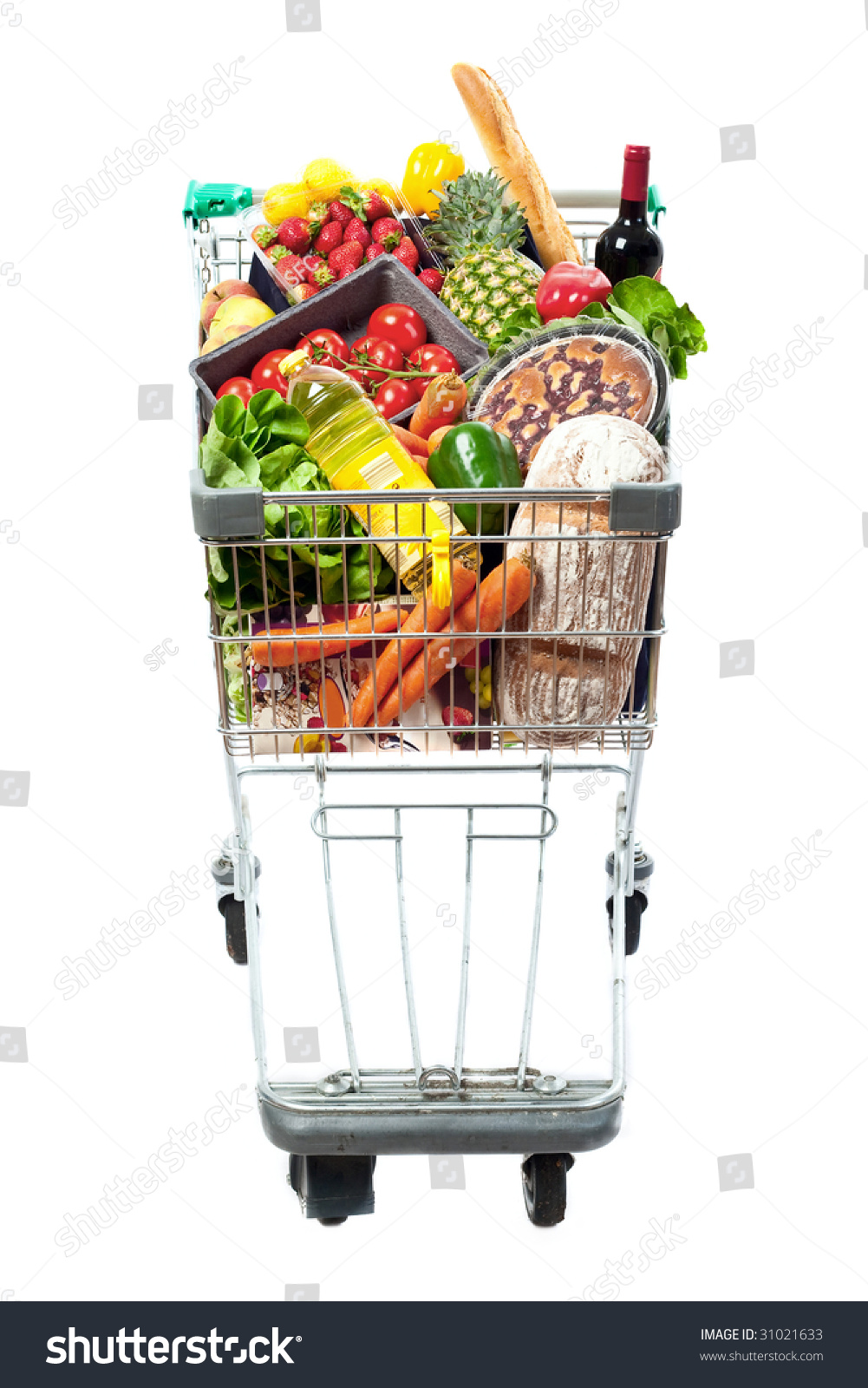 A frontal view of a shopping trolley filled with a selection of fresh food #31021633