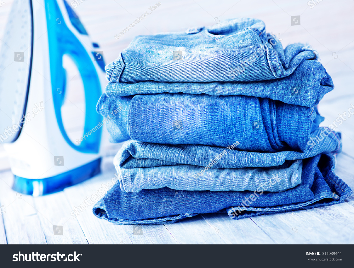 stack of jeans #311039444