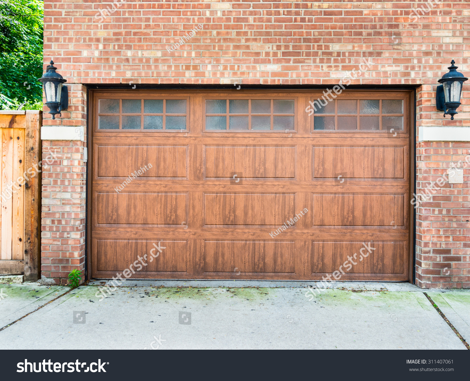 High End Garage Door On A Brick House Stock Photo 311407061