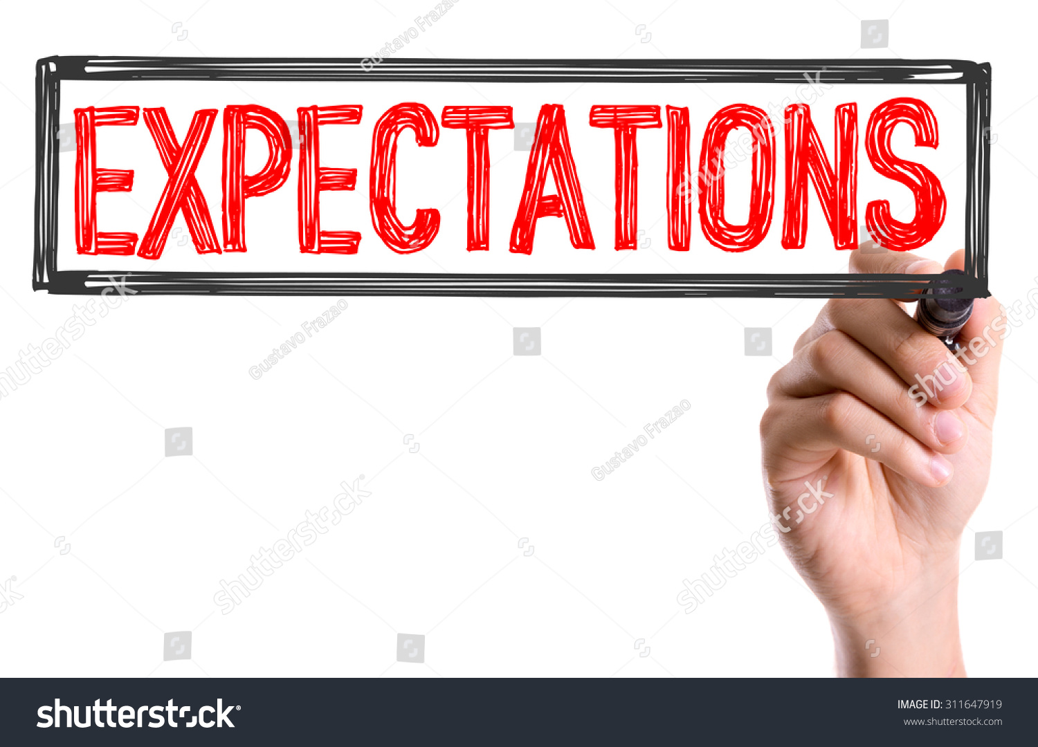Hand with marker writing the word Expectations #311647919