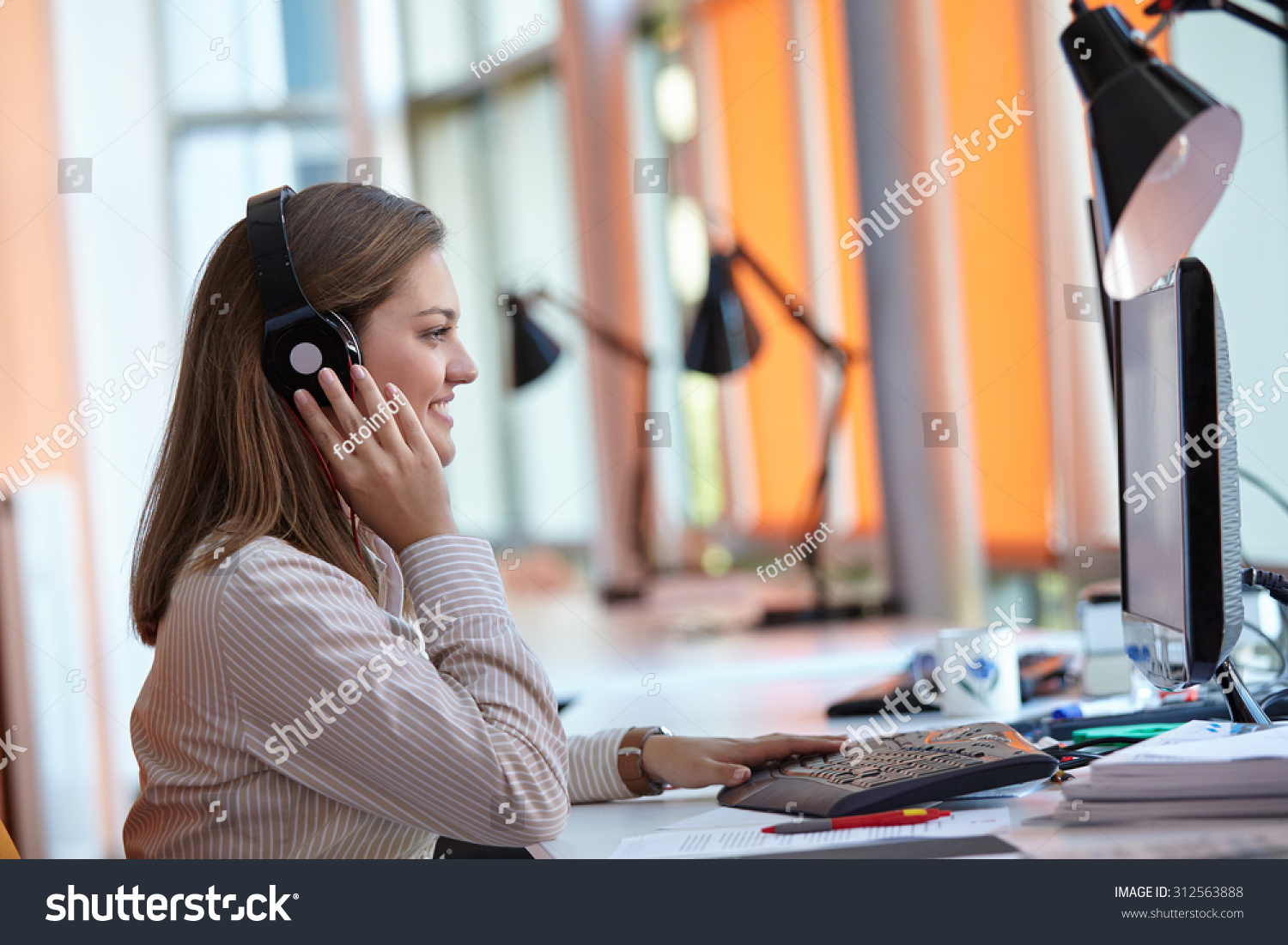 young business woman using computer at office #312563888