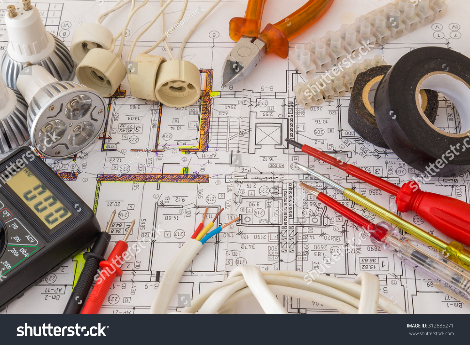 Still Life Of Electrical Components Arranged On Plans #312685271