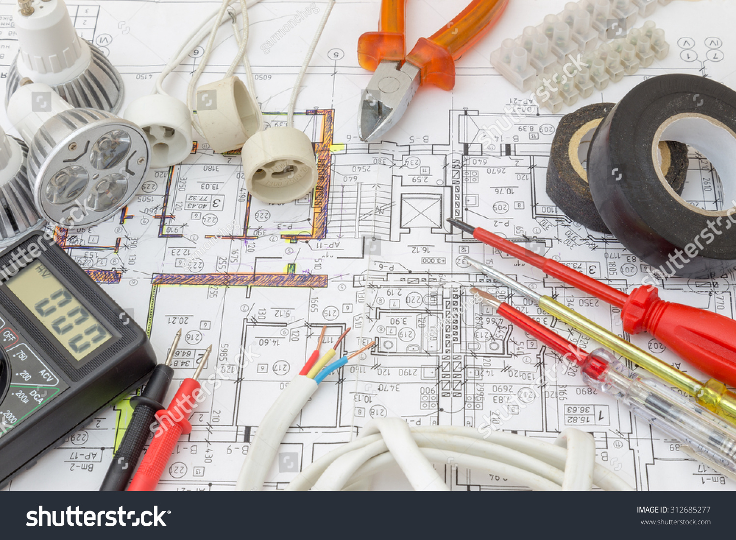 Still Life Of Electrical Components Arranged On Plans #312685277