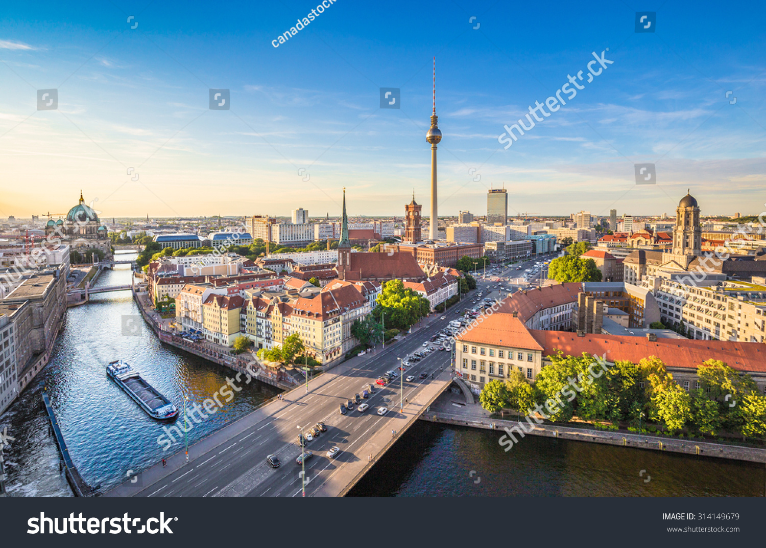 Aerial view of Berlin skyline and Spree river in beautiful evening light at sunset in summer, Germany #314149679