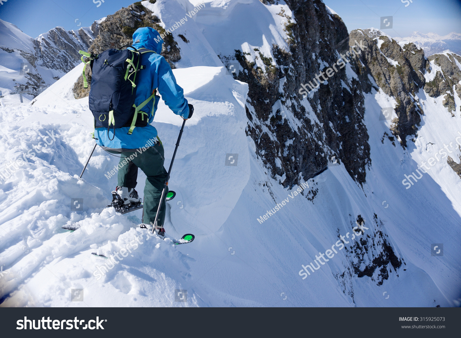 Skier in deep powder, extreme winter freeride #315925073