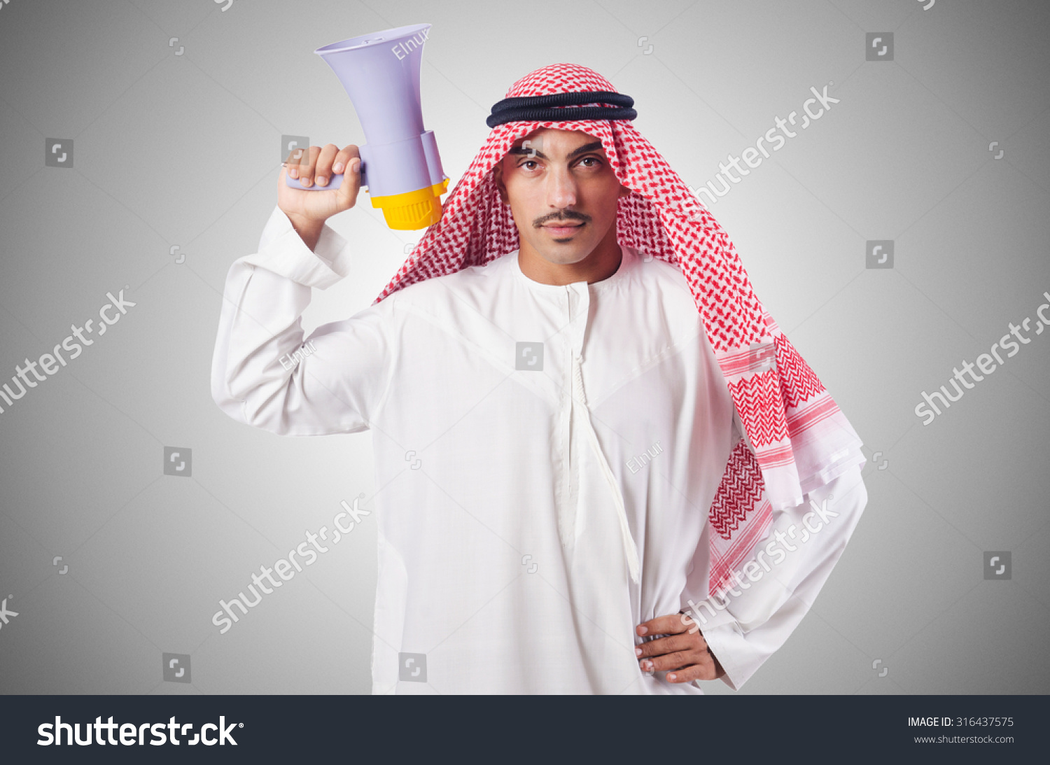 Arab man shouting through loudspeaker #316437575