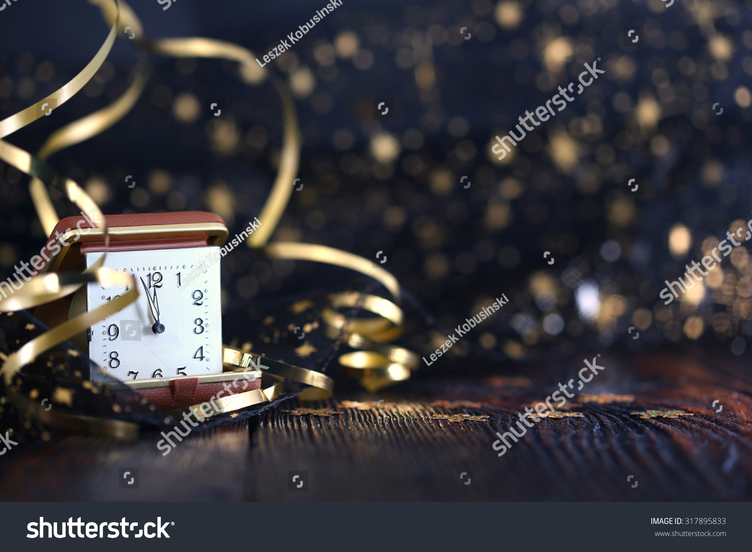 Happy New Year 2020. New year clock on wooden background #317895833