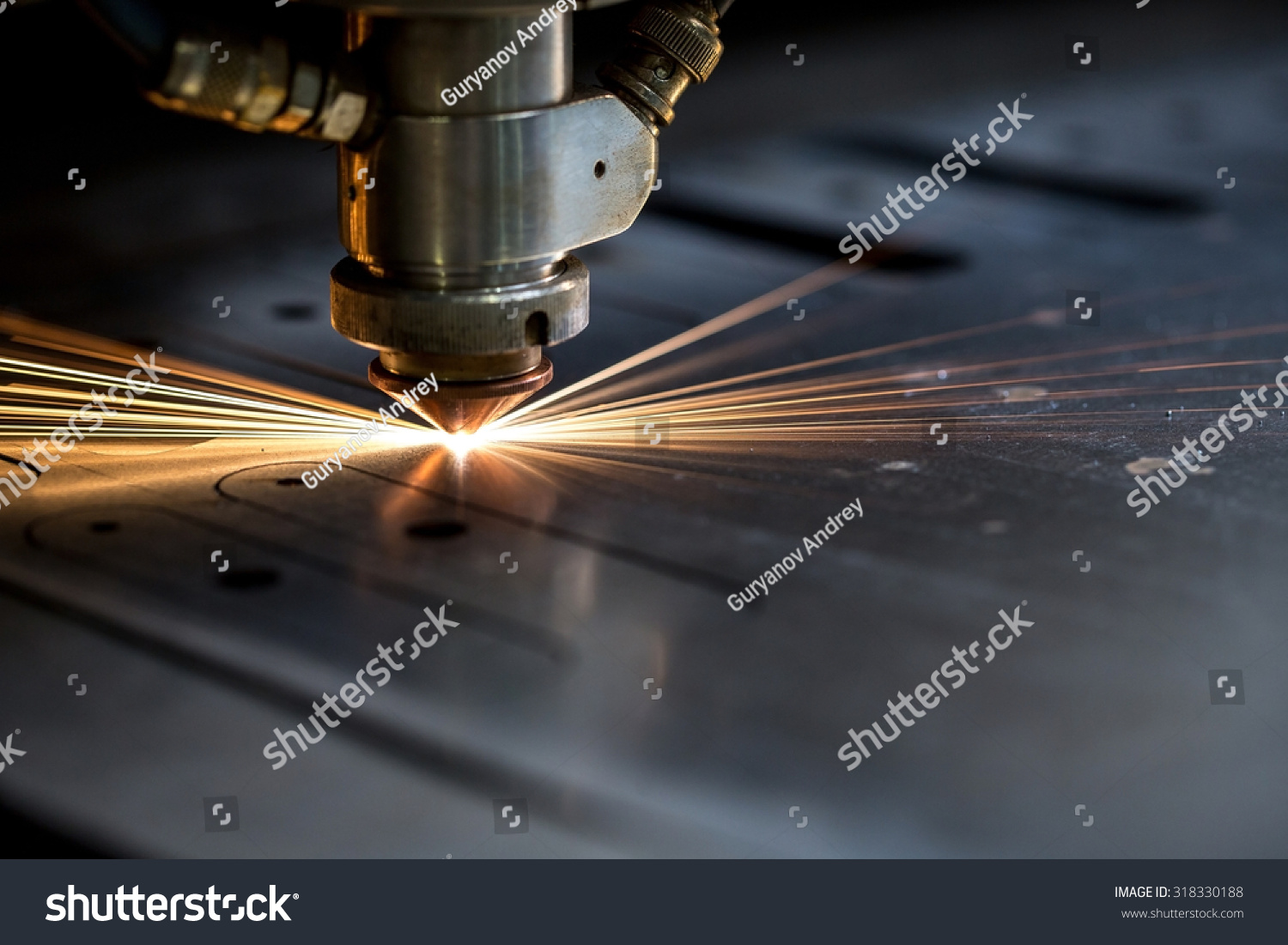Cutting of metal. Sparks fly from laser #318330188